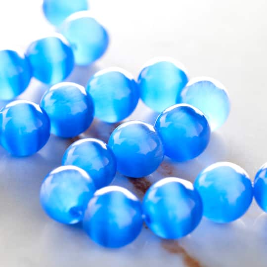 12 Pack: Light Sapphire Cat's Eye Glass Round Beads, 10mm by Bead Landing™
